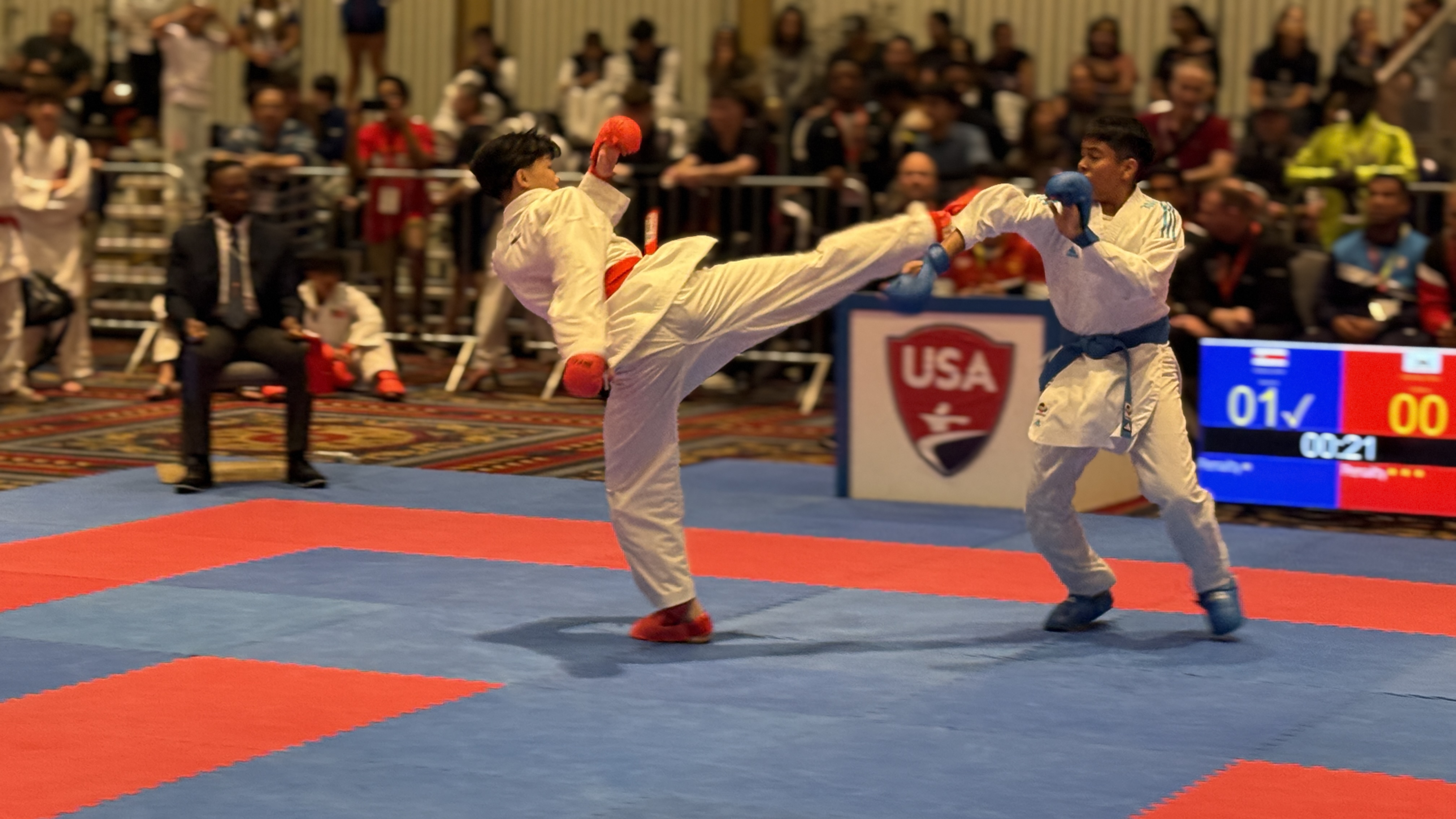 Karate athlete performing a dynamic competition technique